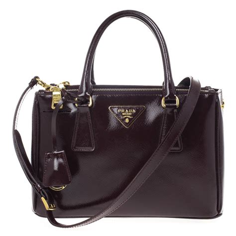 prada vela tote|Prada maroon handbag.